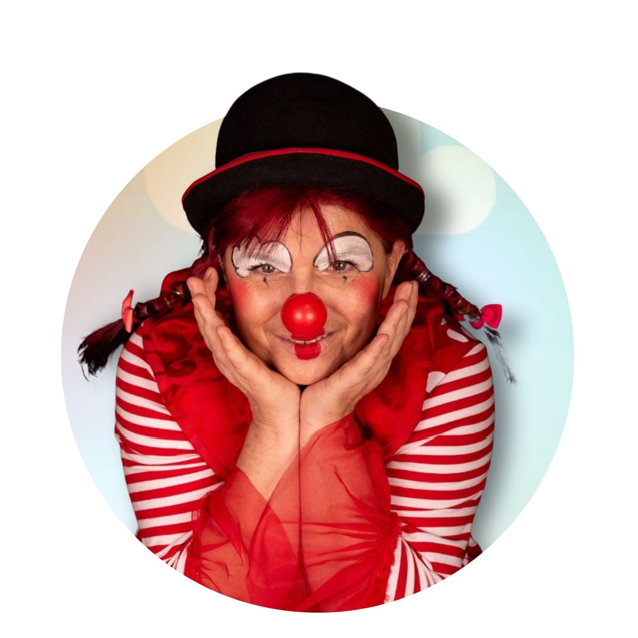 Photo d'Anita le Clown main en corbaille. Logo